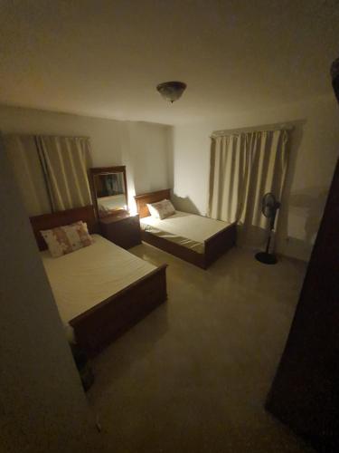 Ένα ή περισσότερα κρεβάτια σε δωμάτιο στο Relaxed sea view chalet