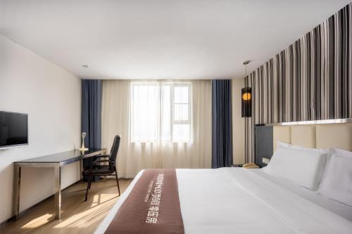 Cama ou camas em um quarto em Shanshui Trends Hotel Zhaoqing Sports Center Qixingyan Scenic Area Branch