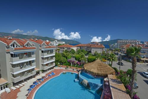 an aerial view of a resort with a swimming pool at Begonville Hotel in Marmaris