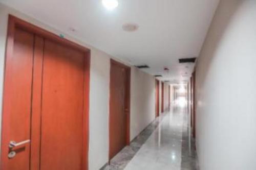 Fotografie z fotogalerie ubytování Apartement Green Lake View Ciputat By NamRoom v destinaci Pondokcabe Hilir