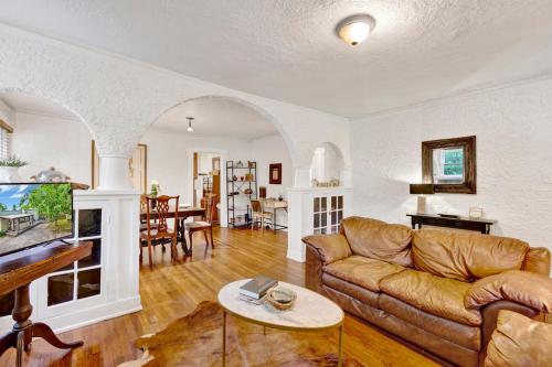 a living room with a couch and a table at Family and Pet friendly Charming Cozy Casita in Birmingham