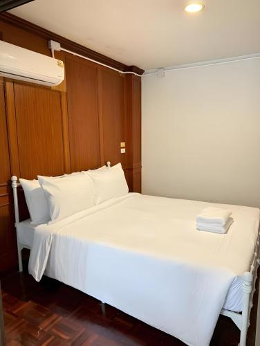 Ένα ή περισσότερα κρεβάτια σε δωμάτιο στο Stay On Sukhumvit Soi 11 - สเตย์ ออน สุขุมวิท 11