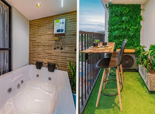 a bath tub and a bar in a balcony at Edificio Habitare Cristales Cali 2 in Cali