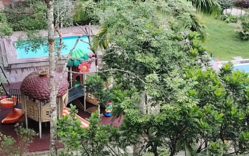 an overhead view of a house with a swimming pool at YUYU B2 Honeymoon WiFi Genting highland in Genting Highlands