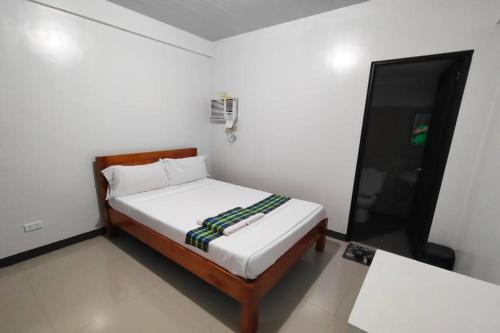Postel nebo postele na pokoji v ubytování Benediktus Pilgerhaus Inn Vigan