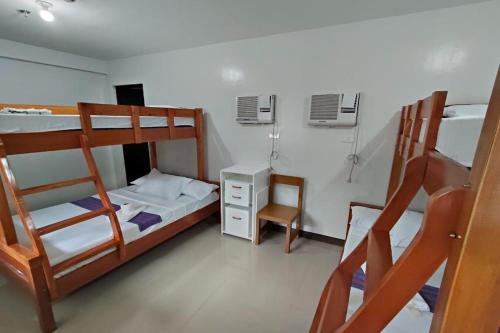 Postel nebo postele na pokoji v ubytování Benediktus Pilgerhaus Inn Vigan