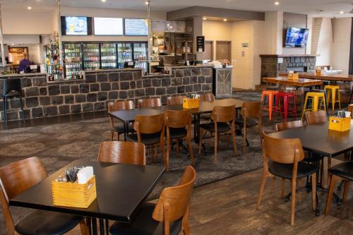 Alpine Hotel Brightにあるレストランまたは飲食店