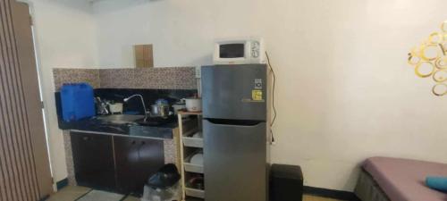 Η κουζίνα ή μικρή κουζίνα στο 102 Plaza overlooking room
