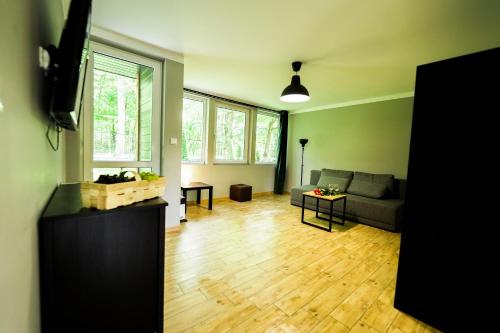Χώρος καθιστικού στο River Park Domki Wśród Drzew Wzdłuż Rzeki