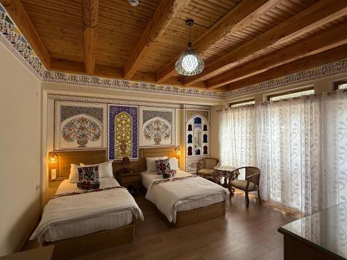 Ένα ή περισσότερα κρεβάτια σε δωμάτιο στο Hotel Fatima Boutique