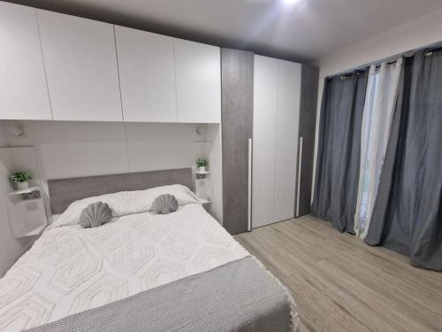 Postel nebo postele na pokoji v ubytování DIoOr luxurious Suites