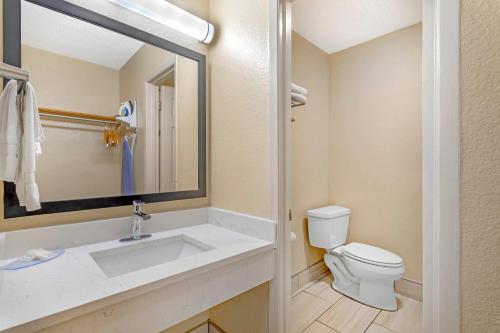a bathroom with a sink and a toilet at Econo Lodge Inn & Suites Gatlinburg at the Convention Center in Gatlinburg