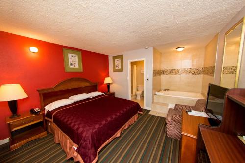 Postel nebo postele na pokoji v ubytování Scottish Inn and Suites - Bensalem-Philadelphia