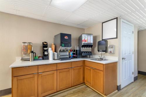 a kitchen with a counter with a coffee maker at Econo Lodge Inn & Suites Gatlinburg at the Convention Center in Gatlinburg