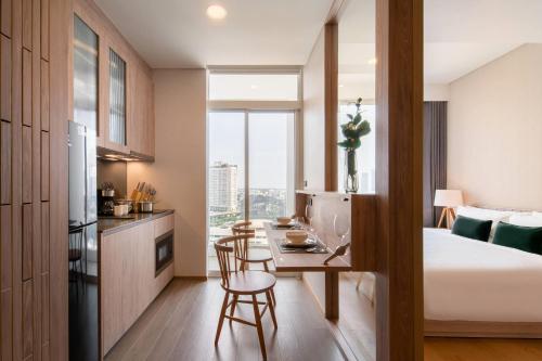 Кровать или кровати в номере Wyndham Garden Bangkok Sukhumvit 42