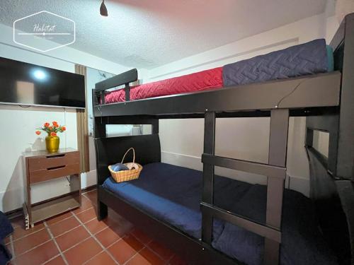 Postel nebo postele na pokoji v ubytování Hotel Habitat Hospedaje