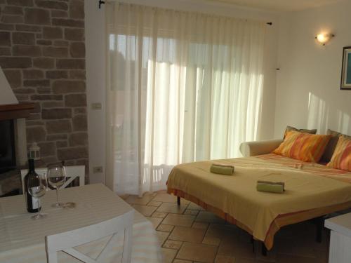 Postel nebo postele na pokoji v ubytování Apartment Lorenzo