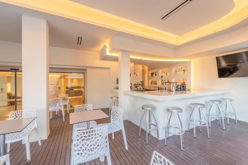 TV a/nebo společenská místnost v ubytování Arte Hotel
