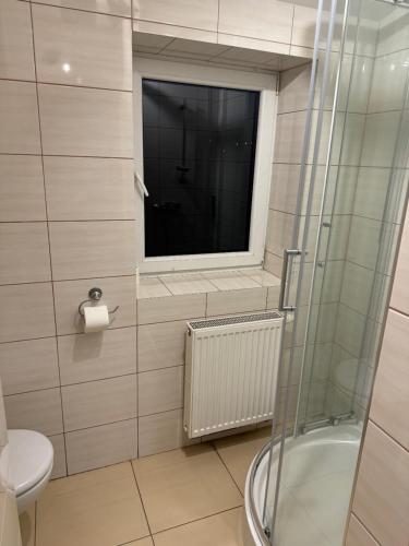 Ένα μπάνιο στο Łysokanie, Niepołomice , noclegi, kwatery dla firm, pokoje