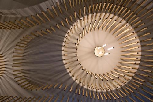 an overhead view of a spiral staircase in a building at Central Hotel, Trademark Collection by Wyndham in Bucharest