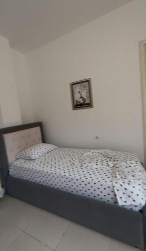 Кровать или кровати в номере Vila Erioni Ksamil