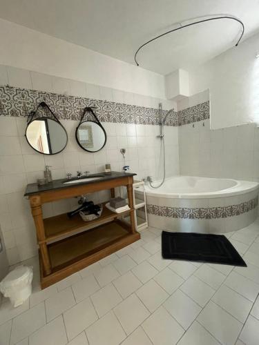 Koupelna v ubytování A l'ombre des oliviers