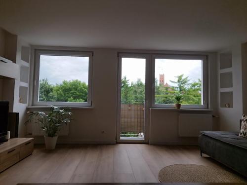 Χώρος καθιστικού στο Zamek i Rzeka- apartament w Malborku