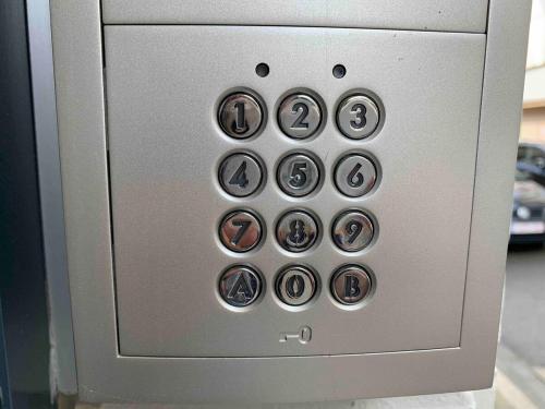 a close up of a control panel with buttons at Home in Antwerp city center in Antwerp