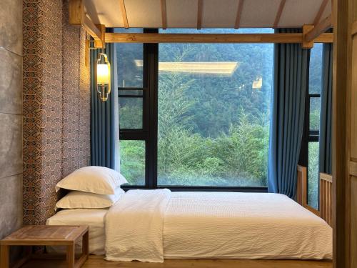 Fotografie z fotogalerie ubytování Zhangjiajie Qiquan Vacation B&B v destinaci Čang-ťia-ťie