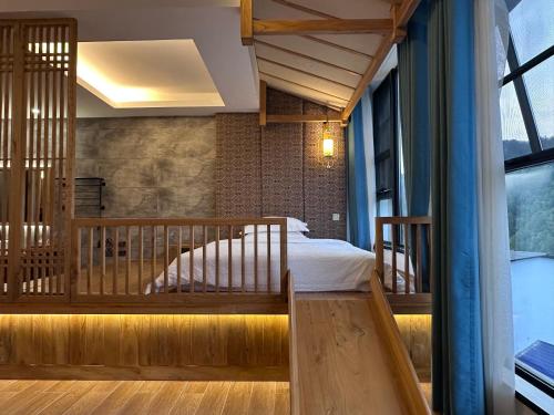 Fotografie z fotogalerie ubytování Zhangjiajie Qiquan Vacation B&B v destinaci Čang-ťia-ťie