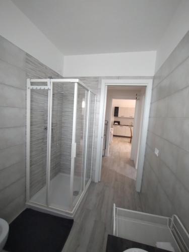 a bathroom with a glass shower in a room at Oltre le mura in Cittadella