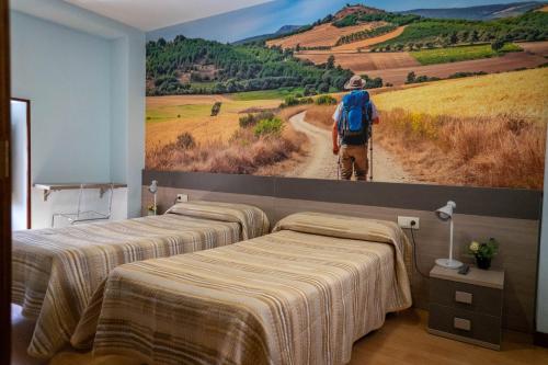 Postel nebo postele na pokoji v ubytování Hostal-Bar Restaurante "La Fuente"