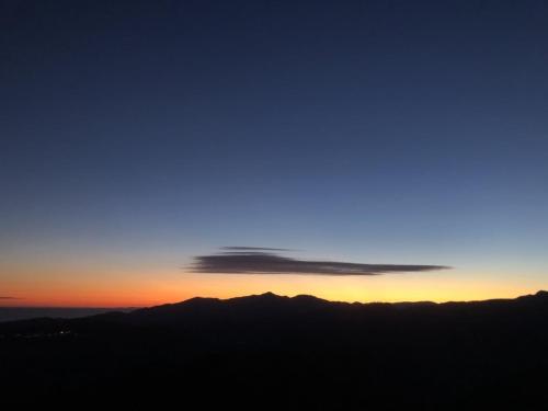 a view of the sunset from the top of a mountain at The Gallery in Baiardo