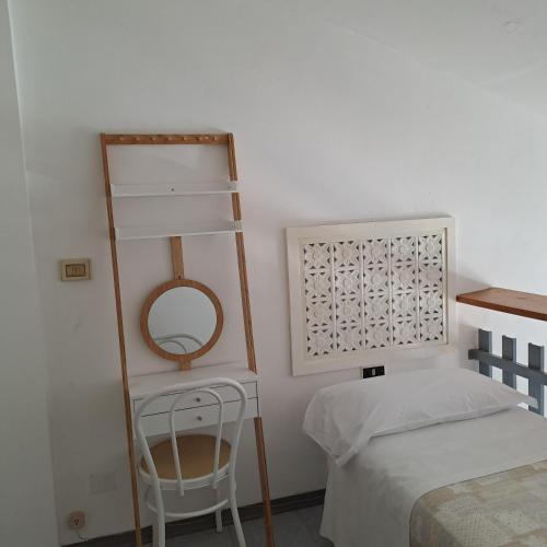 Ένα ή περισσότερα κρεβάτια σε δωμάτιο στο Residence Castiglione