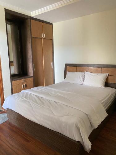 Bedugul Lake View Innにあるベッド