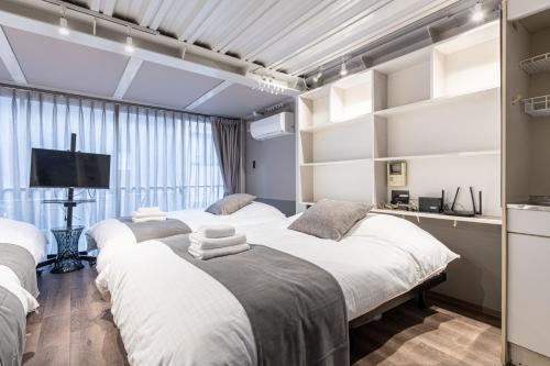 グラスキャビン浜松町aw Second and third floors