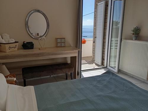 Ένα ή περισσότερα κρεβάτια σε δωμάτιο στο Pantokratoras Sunset