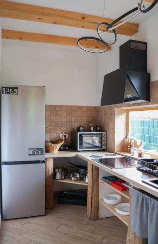 ABC Apartma Kočevskoにあるキッチンまたは簡易キッチン