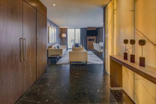 a hallway of a hotel with a living room at The Westin Santa Fe, Mexico City in Mexico City