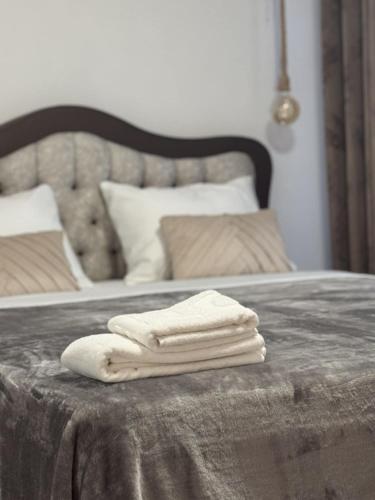 Katil atau katil-katil dalam bilik di Apartman Booem
