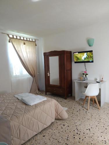 Letto o letti in una camera di La Bouganville B&B