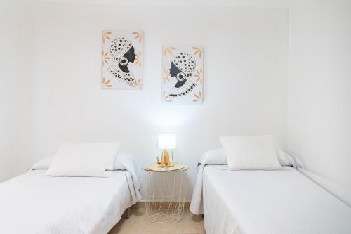 Katil atau katil-katil dalam bilik di Apartamento en el centro de Águilas - By Aloha Palma