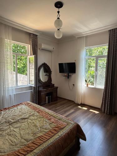 Postel nebo postele na pokoji v ubytování Guesthouse Mtsvane Koncxi 22