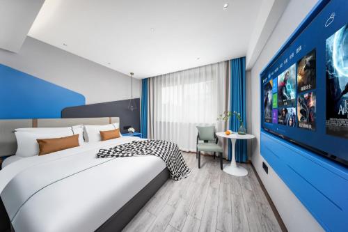 Postelja oz. postelje v sobi nastanitve Yiwu Jane Eyre Hotel