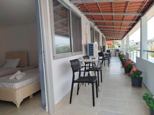 Ένα ή περισσότερα κρεβάτια σε δωμάτιο στο Villa Andi