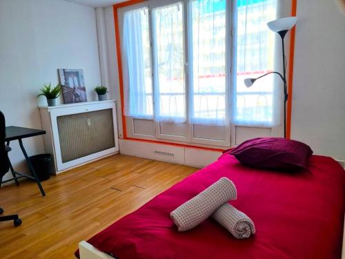 Postel nebo postele na pokoji v ubytování Grand appartement