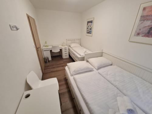 Giường trong phòng chung tại Exclusive APARTMENT Lipno Wellness & SPA