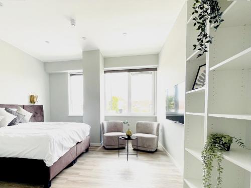 Ένα ή περισσότερα κρεβάτια σε δωμάτιο στο Private Room With Cozy Bed, Bathroom & Wifi