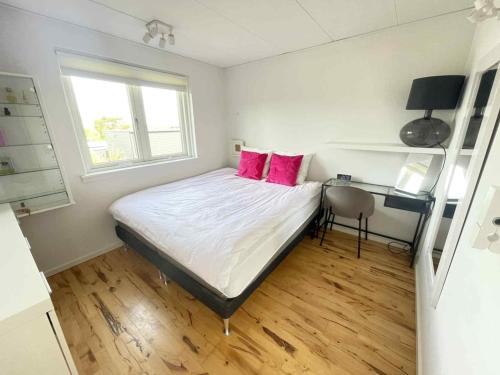 Postel nebo postele na pokoji v ubytování Hygge apartament