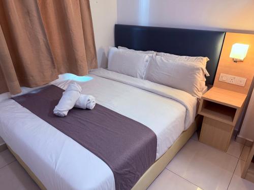 Postel nebo postele na pokoji v ubytování Eco Roomy Hotel